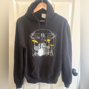 Da Vinci’s Vitruvius Man as rockstar drummer. Fits as size M/L. Made in Italy